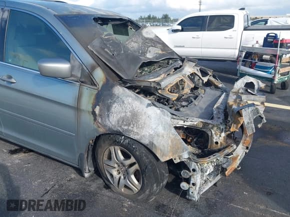 ✅ 2006 Honda Odyssey EX • VIN: 5FNRL38476B110609 • Lot: 43392891. Listed on IAAI with Not provided. Free auction sales archive from the USA and detailed vehicle history report at DreamBid. Image 12.