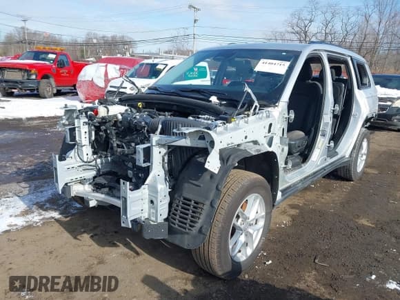 ✅ 2023 Jeep Grand Cherokee Altitude • VIN: 1C4RJKAG1P8865521 • Lot: 41404715. Listed on IAAI with 5 mi. Free auction sales archive from the USA and detailed vehicle history report at DreamBid. Image 2.
