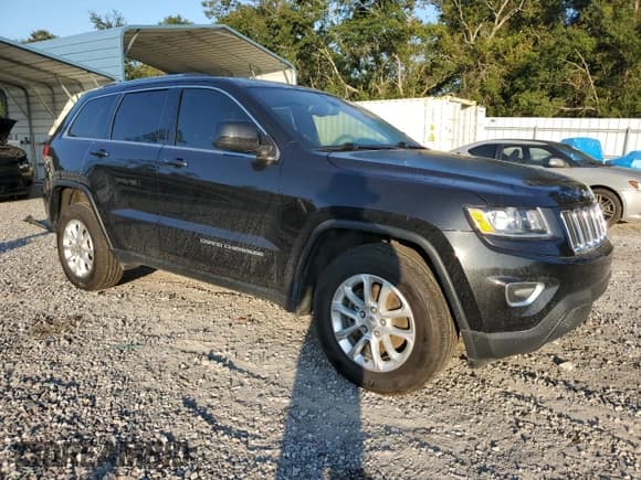 ✅ 2015 Jeep Grand Cherokee Laredo • VIN: 1C4RJEAG2FC707086 • Lot: 84167785. Listed on Copart with 100,035 mi. Free auction sales archive from the USA and detailed vehicle history report at DreamBid. Image 4.