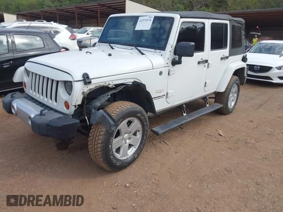 ✅ 2012 Jeep Wrangler Unlimited Sahara • VIN: 1C4HJWEG3CL252370 • Lot: 43379374. Wystawiony na IAAI z przebiegiem 219 023 mil. Bezpłatny archiwum sprzedaży aukcyjnych z USA i szczegółowy raport historii pojazdu na DreamBid. Zdjęcie 17.