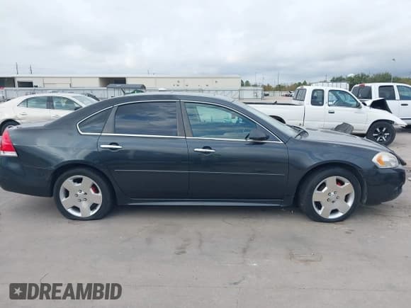 ✅ 2014 Chevrolet Impala LTZ • VIN: 2G1WC5E3XE1189956 • Lot: 43718567. Listed on IAAI with 142,559 mi. Free auction sales archive from the USA and detailed vehicle history report at DreamBid. Image 14.