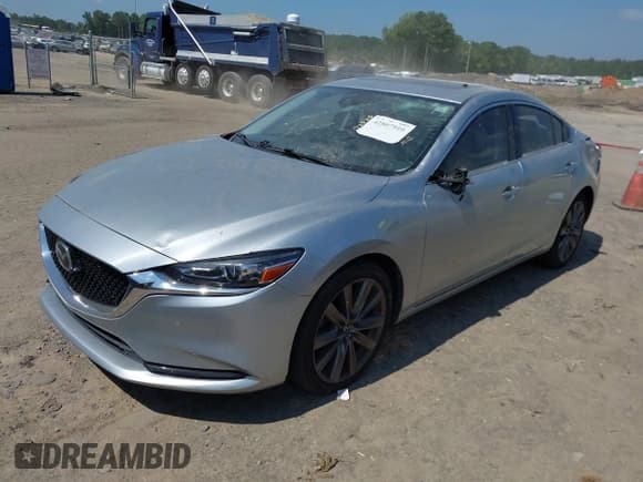 ✅ 2018 Mazda 6 Touring • VIN: JM1GL1VM5J1310583 • Lot: 42807910. Wystawiony na IAAI z przebiegiem 109 440 mil. Bezpłatny archiwum sprzedaży aukcyjnych z USA i szczegółowy raport historii pojazdu na DreamBid. Zdjęcie 2.