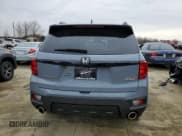 ✅ 2022 Honda Passport Elite • VIN: 5FNYF8H07NB010750 • Lot: 41460683. Wystawiony na Copart z przebiegiem 7 459 mil. Bezpłatny archiwum sprzedaży aukcyjnych z USA i szczegółowy raport historii pojazdu na DreamBid. Zdjęcie 6.