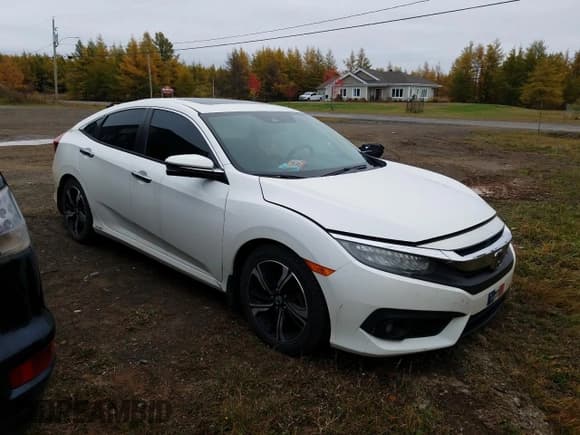 ✅ 2016 Honda Civic Touring • VIN: 2HGFC1F96GH100592 • Lot: 87394375. Listed on Copart with 225,190 mi. Free auction sales archive from the USA and detailed vehicle history report at DreamBid. Image 4.