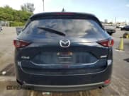 ✅ 2018 Mazda CX-5 Touring • VIN: JM3KFACM6J1448886 • Lot: 91935085. Wystawiony na Copart z przebiegiem 102 177 mil. Bezpłatny archiwum sprzedaży aukcyjnych z USA i szczegółowy raport historii pojazdu na DreamBid. Zdjęcie 6.