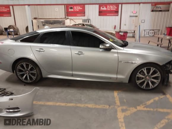 ✅ 2015 Jaguar XJ • VIN: SAJWA1CZ8F8V83873 • Лот: 41271111. Опубликован ранее на IAAI с пробегом 94 830 миль. Бесплатный доступ к архиву аукционных продаж из США и подробный отчёт об истории автомобиля на DreamBid. Изображение 14.