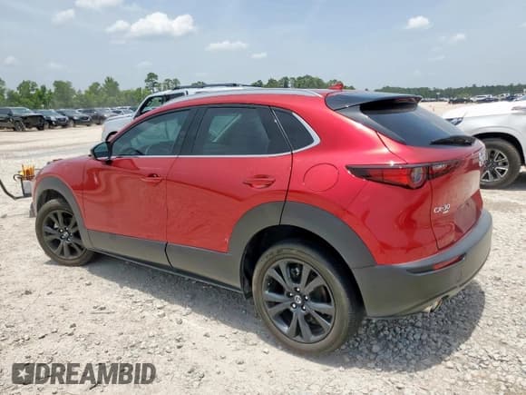 ✅ 2023 Mazda CX-30 Premium • VIN: 3MVDMBDY8PM570075 • Lot: 63523185. Listed on Copart with 10,939 mi. Free auction sales archive from the USA and detailed vehicle history report at DreamBid. Image 2.