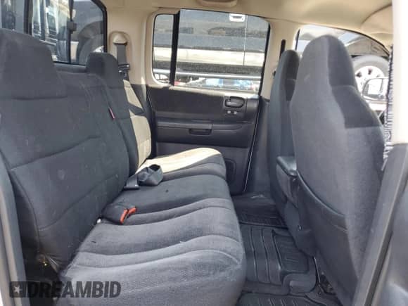 2004 Dodge Dakota SLT с VIN 1D7HG48N54S632126, выставлен на аукционе Copart как лот 64717544 с пробегом 187 896 миль миль и Чистый • Clean title. История ставок и продаж доступна на DreamBid. Изображение 10.