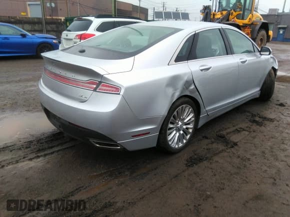 ✅ 2013 Lincoln MKZ • VIN: 3LN6L2JKXDR811822 • Lot: 42009690. Listed on IAAI with 128,405 mi. Free auction sales archive from the USA and detailed vehicle history report at DreamBid. Image 4.