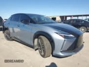 ✅ 2023 Lexus RZ 450e Premium • VIN: JTJAAAAB9PA007912 • Lot: 79579694. Wystawiony na Copart z przebiegiem 18 443 mil. Bezpłatny archiwum sprzedaży aukcyjnych z USA i szczegółowy raport historii pojazdu na DreamBid. Zdjęcie 4.