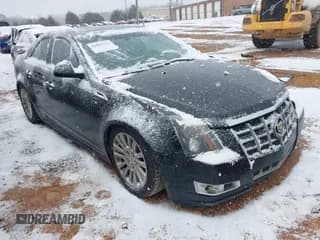 ✅ 2012 Cadillac CTS Premium • VIN: 1G6DP5E38C0118009 • Lot: 41628041. Listed on IAAI with 126,310 mi. Free auction sales archive from the USA and detailed vehicle history report at DreamBid. Image 1.