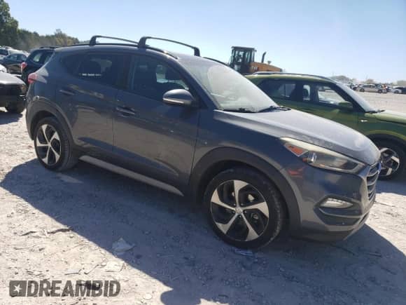 2018 Hyundai Tucson Limited z VIN KM8J33A28JU724148, wystawiony jako Copart lot #86606695 z przebiegiem 159 062 mil mil oraz Czysty tytuł • Clean title. Historia ofert i sprzedaży dostępna na DreamBid. Obrazek 4.