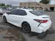 2023 Toyota Camry SE with VIN 4T1G11BKXPU103411, listed as a IAAI auction lot 43192965 with 14,378 mi miles and . Bid and sale history available at DreamBid. Image 3.