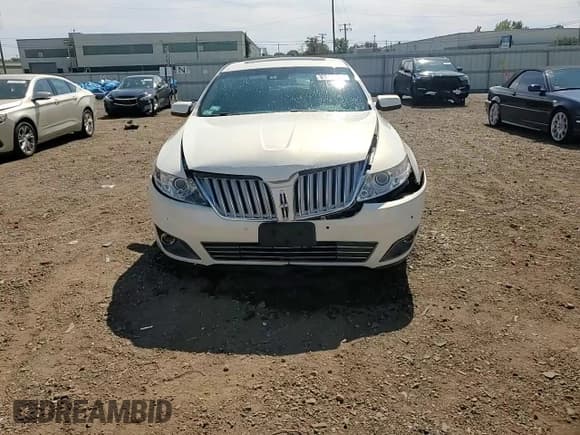 ✅ 2012 Lincoln MKS • VIN: 1LNHL9DRXCG805826 • Lot: 80085835. Listed on Copart with 125,456 mi. Free auction sales archive from the USA and detailed vehicle history report at DreamBid. Image 13.