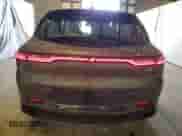 2024 Dodge Hornet R/T z VIN ZACPDFCW6R3A27983, wystawiony jako Copart lot #47845855 z przebiegiem 18 861 mil mil oraz Czysty tytuł • Clean title. Historia ofert i sprzedaży dostępna na DreamBid. Obrazek 6.