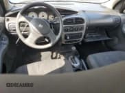 ✅ 2005 Dodge Neon SXT • VIN: 1B3ES56C05D135155 • Lot: 52856545. Listed on Copart with 135,142 mi. Free auction sales archive from the USA and detailed vehicle history report at DreamBid. Image 8.