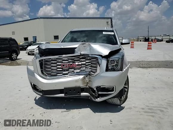 ✅ 2018 GMC Yukon Denali • VIN: 1GKS1CKJ2JR395443 • Lot: 69065785. Wystawiony na Copart z przebiegiem 27 888 mil. Bezpłatny archiwum sprzedaży aukcyjnych z USA i szczegółowy raport historii pojazdu na DreamBid. Zdjęcie 14.