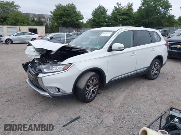 2018 Mitsubishi Outlander ES with VIN JA4AZ3A39JZ034210, listed as a IAAI auction lot 43236372 with 106,016 mi miles and . Bid and sale history available at DreamBid. Image 2.