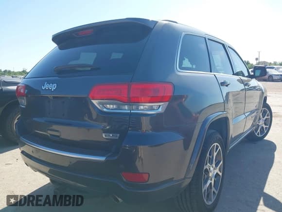 ✅ 2018 Jeep Grand Cherokee Limited • VIN: 1C4RJEBG0JC141548 • Lot: 41969424. Listed on IAAI with 112,819 mi. Free auction sales archive from the USA and detailed vehicle history report at DreamBid. Image 4.