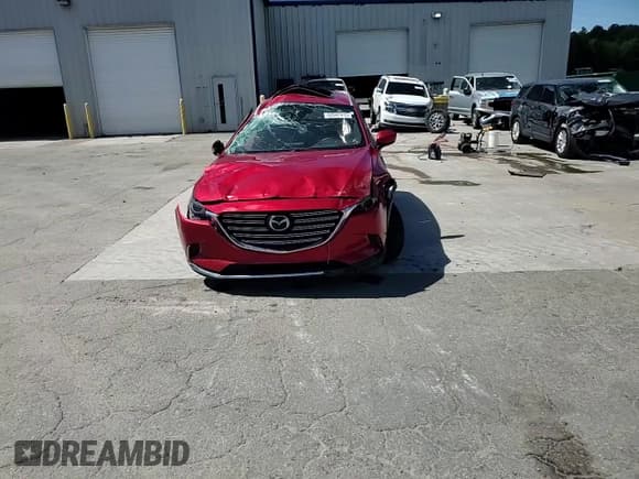 ✅ 2016 Mazda CX-9 Grand Touring • VIN: JM3TCBDY8G0108058 • Lot: 83947415. Wystawiony na Copart z przebiegiem Nie podano. Bezpłatny archiwum sprzedaży aukcyjnych z USA i szczegółowy raport historii pojazdu na DreamBid. Zdjęcie 14.