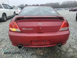 2006 Hyundai Tiburon GS z VIN KMHHM65D46U204206, wystawiony jako Copart lot #44522185 z przebiegiem 73 940 mil mil oraz Czysty tytuł • Clean title. Historia ofert i sprzedaży dostępna na DreamBid. Obrazek 6.
