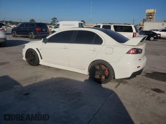 ✅ 2014 Mitsubishi Lancer Evolution GSR • VIN: JA32W8FV5EU023703 • Lot: 72744504. Listed on Copart with Not provided. Free auction sales archive from the USA and detailed vehicle history report at DreamBid. Image 2.