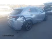 ✅ 2023 Lexus UX 250h Premium • VIN: JTHP6JBH7P2148102 • Lot: 43488041. Wystawiony na IAAI z przebiegiem 21 340 mil. Bezpłatny archiwum sprzedaży aukcyjnych z USA i szczegółowy raport historii pojazdu na DreamBid. Zdjęcie 4.