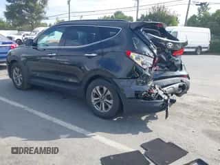 2015 Hyundai Santa Fe with VIN 5XYZU3LB8FG295846, listed as a IAAI auction lot 43174087 with 105,223 mi miles and . Bid and sale history available at DreamBid. Image 3.