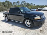 ✅ 2003 Ford F-150 Harley-Davidson • VIN: 1FTRW07383KD62463 • Lot: 49995655. Listed on Copart with 131,683 mi. Free auction sales archive from the USA and detailed vehicle history report at DreamBid. Image 4.