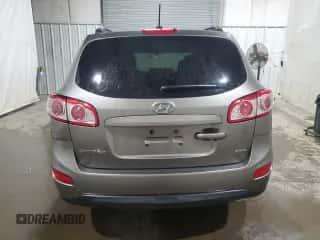 2012 Hyundai Santa Fe GLS с VIN 5XYZGDAB1CG163362, выставлен на аукционе Copart как лот 72895144 с пробегом 95 289 миль миль и Списание • Salvage title. История ставок и продаж доступна на DreamBid. Изображение 6.