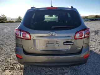 2012 Hyundai Santa Fe GLS с VIN 5XYZGDABXCG160265, выставлен на аукционе Copart как лот 70721424 с пробегом 115 181 миль миль и Списание • Salvage title. История ставок и продаж доступна на DreamBid. Изображение 6.