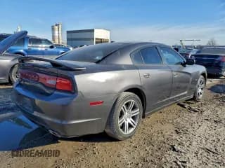 ✅ 2013 Dodge Charger RT • VIN: 2C3CDXCT3DH715831 • Lot: 96350405. Listed on Copart with 112,972 mi. Free auction sales archive from the USA and detailed vehicle history report at DreamBid. Image 3.