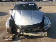 ✅ 2005 Nissan 350Z • VIN: JN1AZ34D05M605342 • Лот: 69046905. Опубликован ранее на Copart с пробегом 84 516 миль. Бесплатный доступ к архиву аукционных продаж из США и подробный отчёт об истории автомобиля на DreamBid. Изображение 13.