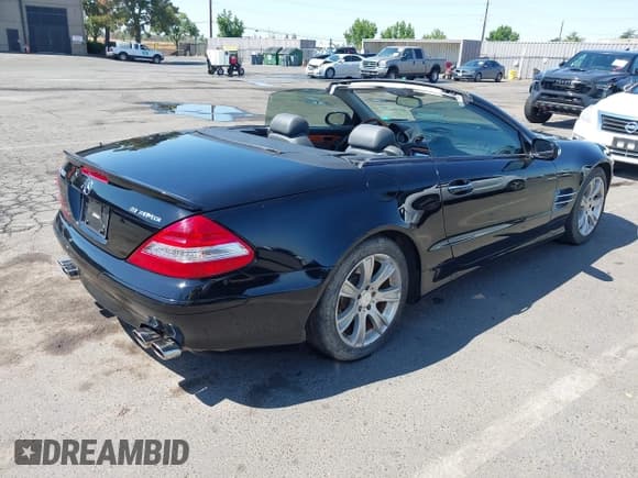 ✅ 2003 Mercedes-Benz SL 500 • VIN: WDBSK75F23F056076 • Lot: 42709424. Listed on IAAI with 93,834 mi. Free auction sales archive from the USA and detailed vehicle history report at DreamBid. Image 4.