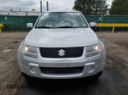 ✅ 2008 Suzuki Grand Vitara w/Spare & Cargo Covers • VIN: JS3TD941784100899 • Lot: 62581725. Wystawiony na Copart z przebiegiem 104 502 mil. Bezpłatny archiwum sprzedaży aukcyjnych z USA i szczegółowy raport historii pojazdu na DreamBid. Zdjęcie 5.
