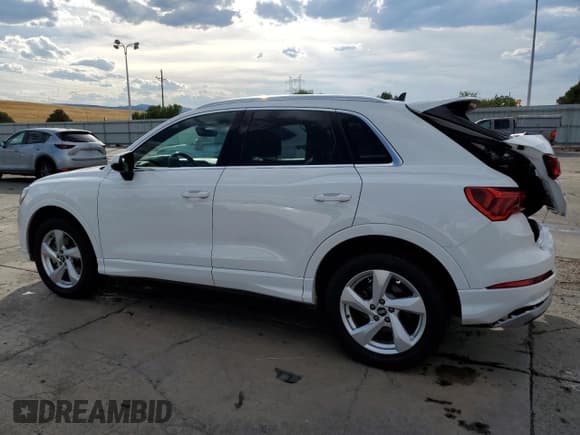 ✅ 2021 Audi Q3 Premium • VIN: WA1AUCF38M1089564 • Lot: 68207855. Listed on Copart with 71,401 mi. Free auction sales archive from the USA and detailed vehicle history report at DreamBid. Image 2.