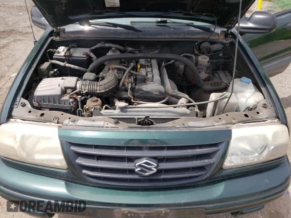 ✅ 2003 Suzuki Vitara JLX • VIN: 2S3TD52V136101732 • Лот: 58477845. Опубликован ранее на Copart с пробегом 105 628 миль. Бесплатный доступ к архиву аукционных продаж из США и подробный отчёт об истории автомобиля на DreamBid. Изображение 12.