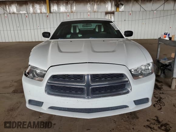 ✅ 2013 Dodge Charger SE • VIN: 2C3CDXBG1DH628305 • Lot: 82633525. Wystawiony na Copart z przebiegiem 177 611 mil. Bezpłatny archiwum sprzedaży aukcyjnych z USA i szczegółowy raport historii pojazdu na DreamBid. Zdjęcie 5.