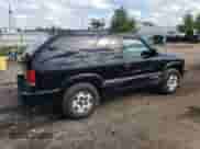 2005 Chevrolet Blazer LS z VIN 1GNCT18X45K112296, wystawiony jako Copart lot #69237215 z przebiegiem 206 198 mil mil oraz Czysty tytuł • Clean title. Historia ofert i sprzedaży dostępna na DreamBid. Obrazek 3.