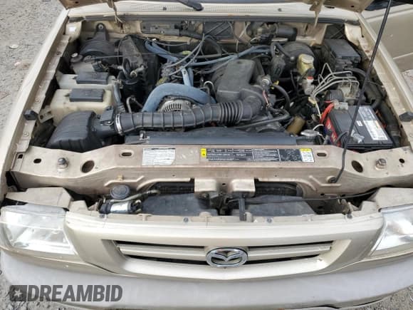 ✅ 2002 Mazda B-Series DS • VIN: 4F4YR16V92TM21743 • Lot: 88746485. Listed on Copart with 154,288 mi. Free auction sales archive from the USA and detailed vehicle history report at DreamBid. Image 11.