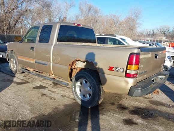 2004 GMC Sierra 1500 SLT with VIN 1GTEK19T14E214460, listed as a IAAI auction lot 41247573 with 213,859 mi miles and . Bid and sale history available at DreamBid. Image 3.