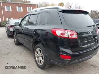 2010 Hyundai Santa Fe SE with VIN 5NMSHDAG1AH357239, listed as a IAAI auction lot 43527010 with 129,496 mi miles and . Bid and sale history available at DreamBid. Image 3.