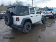 ✅ 2022 Jeep Wrangler Unlimited Sport S • VIN: 1C4HJXDG3NW155467 • Lot: 41638650. Wystawiony na IAAI z przebiegiem 22 698 mil. Bezpłatny archiwum sprzedaży aukcyjnych z USA i szczegółowy raport historii pojazdu na DreamBid. Zdjęcie 4.