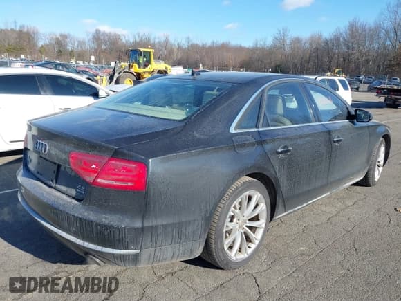✅ 2011 Audi A8 • VIN: WAUAVAFDXBN025061 • Лот: 41326516. Опубликован ранее на IAAI с пробегом 198 850 миль. Бесплатный доступ к архиву аукционных продаж из США и подробный отчёт об истории автомобиля на DreamBid. Изображение 4.