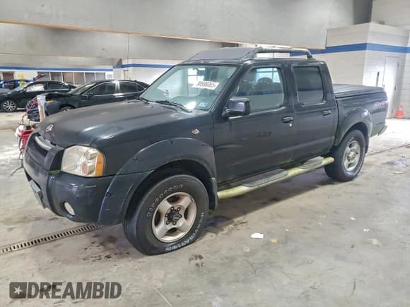 ✅ 2001 Nissan Frontier SE • VIN: 1N6ED27YX1C354977 • Lot: 94596065. Listed on Copart with 125,875 mi. Free auction sales archive from the USA and detailed vehicle history report at DreamBid. Image 1.