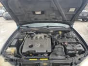 ✅ 2003 Nissan Maxima GLE • VIN: JN1DA31A03T439390 • Лот: 70008165. Опубликован ранее на Copart с пробегом 194 894 миль. Бесплатный доступ к архиву аукционных продаж из США и подробный отчёт об истории автомобиля на DreamBid. Изображение 11.