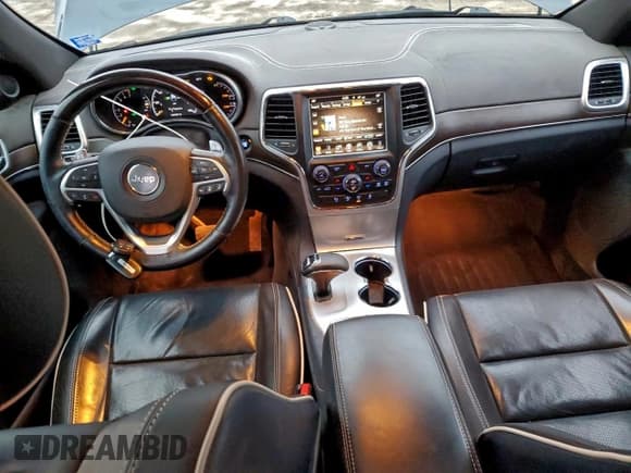 ✅ 2014 Jeep Grand Cherokee Overland • VIN: 1C4RJFCG2EC275066 • Лот: 94445565. Опубликован ранее на Copart с пробегом 164 492 миль. Бесплатный доступ к архиву аукционных продаж из США и подробный отчёт об истории автомобиля на DreamBid. Изображение 8.