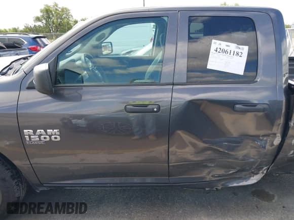 ✅ 2020 Ram 1500 Tradesman • VIN: 1C6RR6FG7LS114615 • Lot: 42061182. Listed on IAAI with 97,341 mi. Free auction sales archive from the USA and detailed vehicle history report at DreamBid. Image 14.