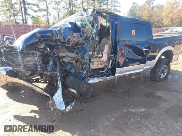 ✅ 2013 Ram 2500 Laramie • VIN: 3C6UR5FL2DG584612 • Lot: 41007044. Wystawiony na IAAI z przebiegiem Nie podano. Bezpłatny archiwum sprzedaży aukcyjnych z USA i szczegółowy raport historii pojazdu na DreamBid. Zdjęcie 2.