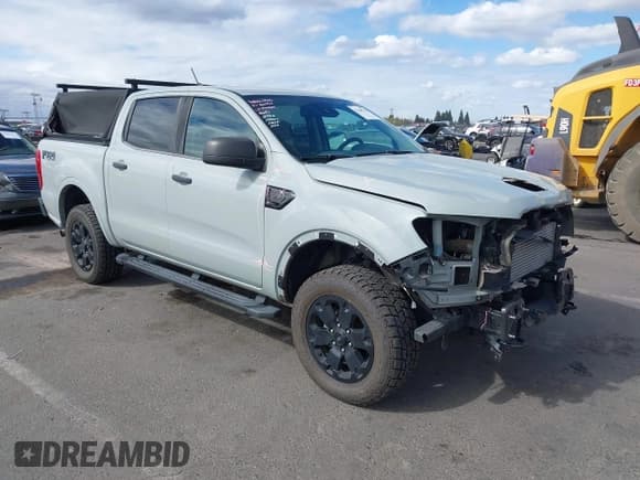 ✅ 2021 Ford Ranger Lariat • VIN: 1FTER4FH8MLD38962 • Lot: 43448744. Listed on IAAI with 38,899 mi. Free auction sales archive from the USA and detailed vehicle history report at DreamBid. Image 1.